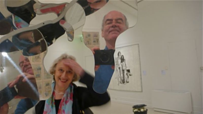 Elaine and John, John and Yoko: reflections in a giraffe made of mirrors in the Pera Museum