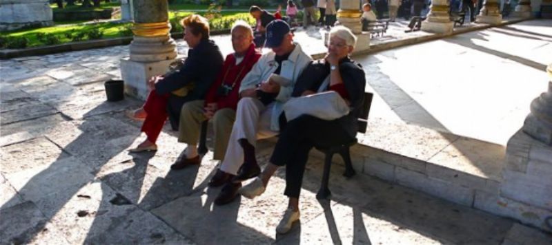 A bench of Americans, I think resting
