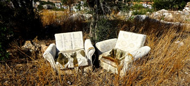Two armchairs abandoned on the path to a major tomb