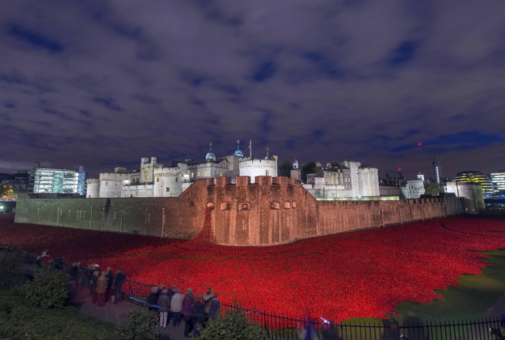 The Tower of London installation, 'Blood Swept Lands and Seas of Red'. The major art installation named “Blood Swept Lands and Seas of Red” consists of 888,246 handmade ceramic poppies, each poppy representing a British fatality during World War I and created by ceramic artist Paul Cummins and stage designer Tom Piper.